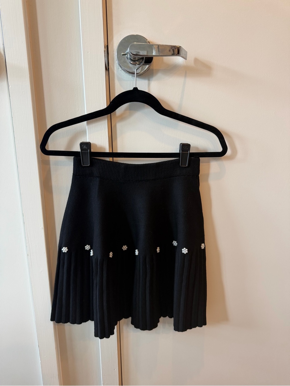 Black Pleated Sweater Mini Skirt with Floral Crystal Accents